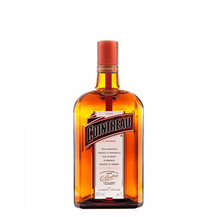 Cointreau Lunique Liqueur 1.75L bottle with orange liqueur and red cap