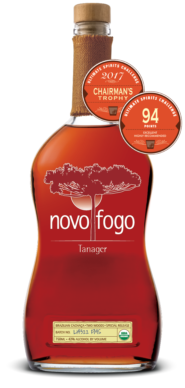 Novo Fogo Tanager Cachaca 84 Proof 750 ML bottle with reddish hue and awards.