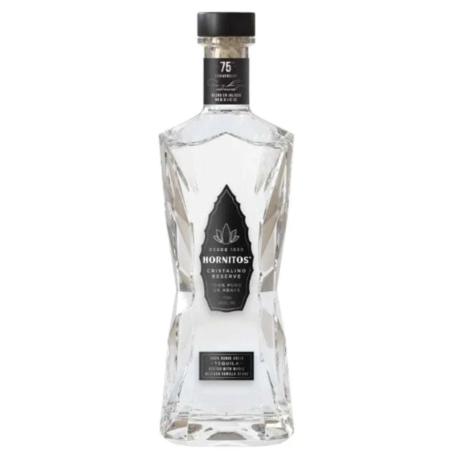 Bottle of Hornitos Tequila Anejo Cristalino 75th Anniversary 750ml with clear aged tequila and elegant packaging