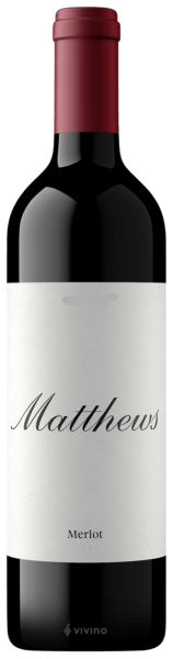 Bottle of Matthews Merlot wine with a red cap and white label.