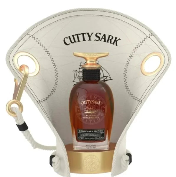 Cutty Sark bottle in a decorative holder on a white background