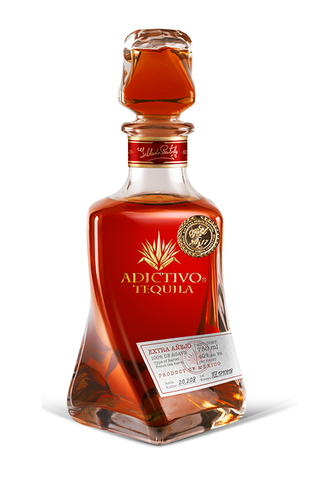 Adictivo Extra Anejo Tequila 750 ML bottle with rich amber liquid and elegant label design.