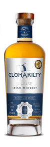 Clonakilty Irish Whiskey bottle with a gold medal from the World Spirits Competition on a white background