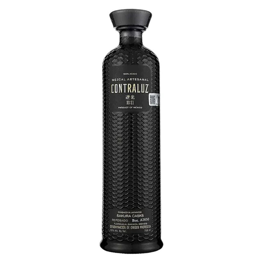 Bottle of Contraluz Mezcal 11 11 finished in Japanese Sakura casks with floral and smoky notes