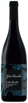 Wine bottle with label featuring floral design and brand name on a black background