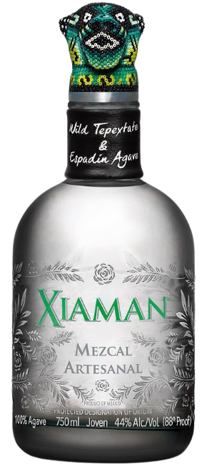 Xiaman Mezcal Artesanal 750ml bottle with floral and agave design, handcrafted mezcal with Espadín and Tepextate agaves.