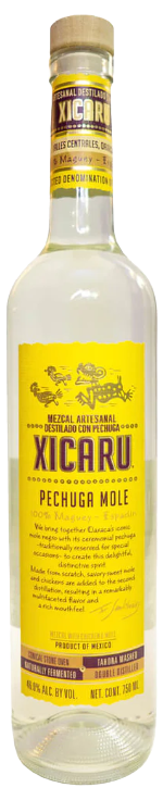 Xicaru Pechuga Mole Mezcal Artesanal 750 ML bottle with a yellow label.