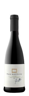 Wine bottle labeled 'The Setting' on a black background