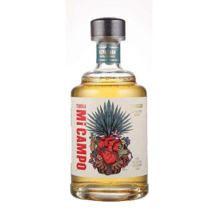 Mi Campo Tequila Reposado 750ml bottle with golden hue crafted from 100% blue Weber agave.