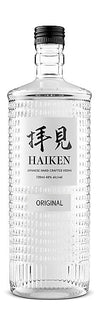 Clear Haiken vodka bottle on a white background